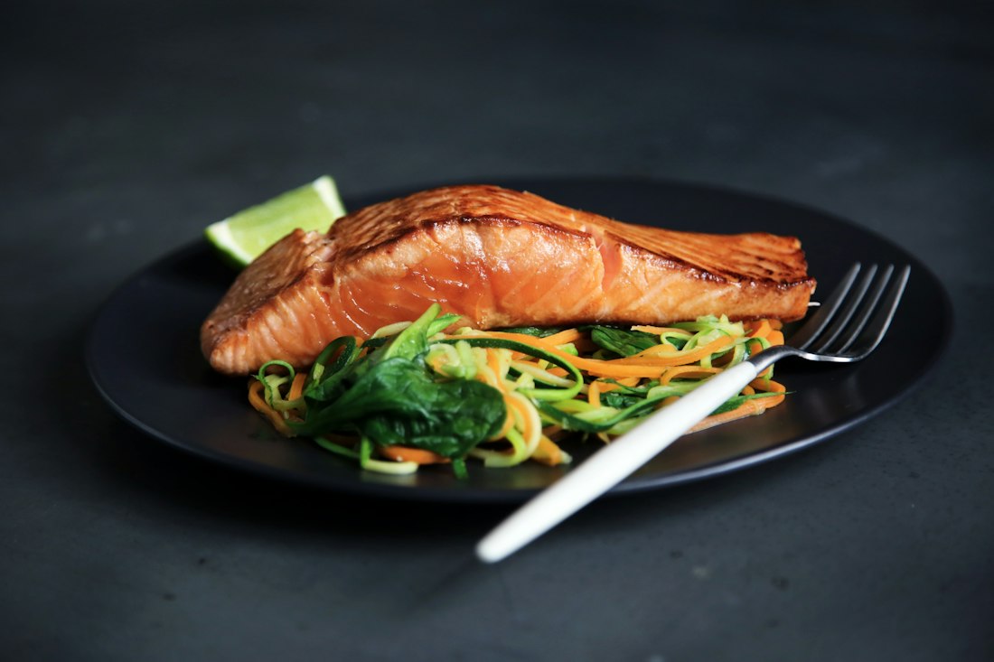 Seasonal fish entrée with vegetables, illustrative demo dish